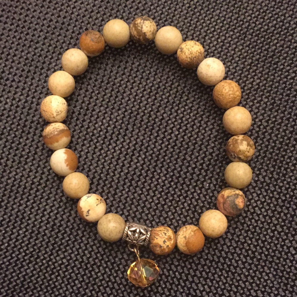 Stackable natural jasper 8mm beads with charm.